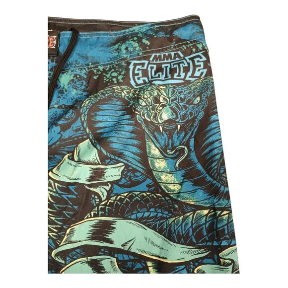Elite MMA Mens Swim Trunks Blue Graphic Cobra Striking Size XL New With Tags - Picture 4 of 12